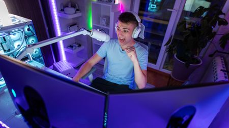 Teenager intrigued while playing video games at night in a vibrant room