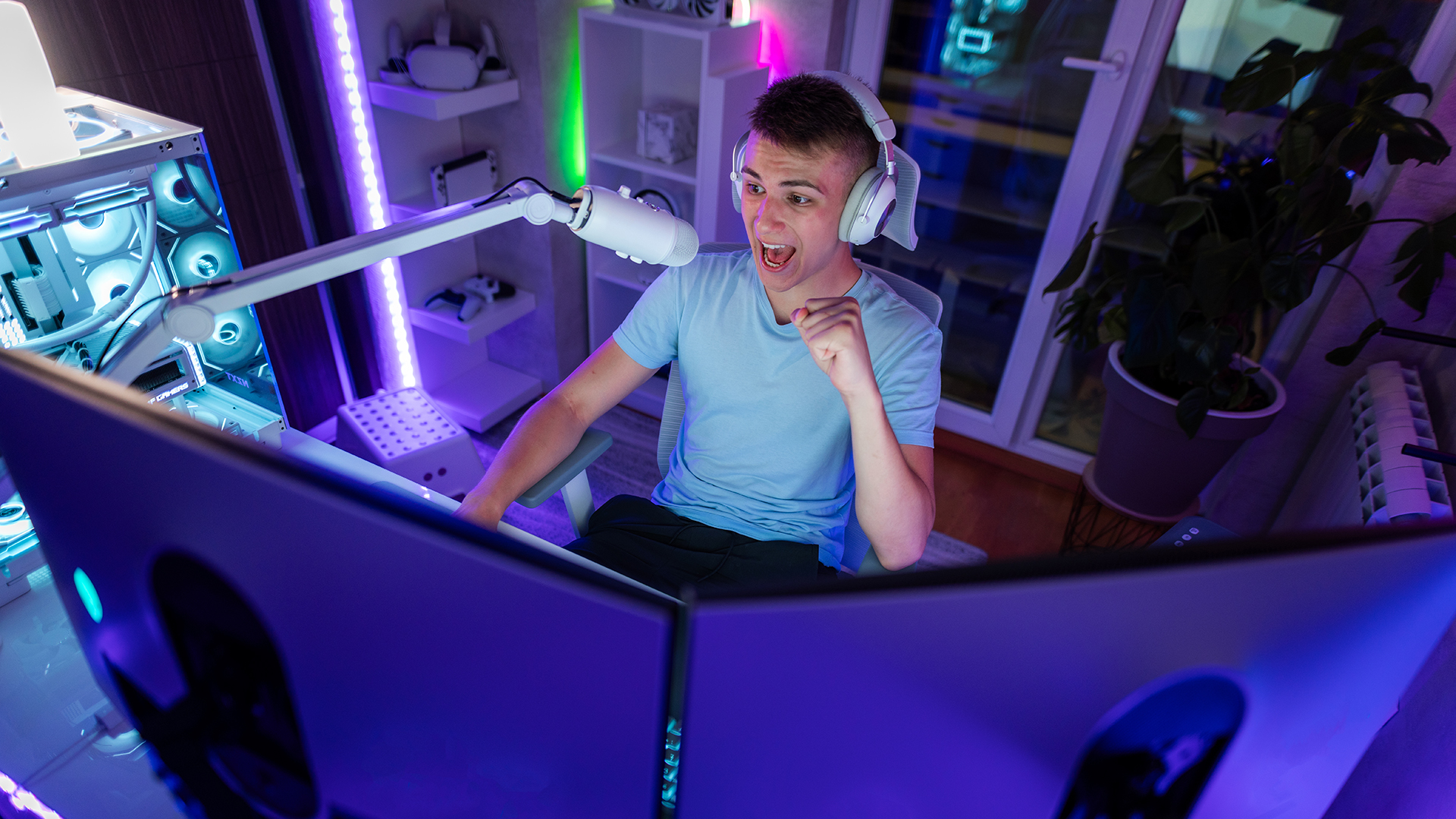 Teenager intrigued while playing video games at night in a vibrant room