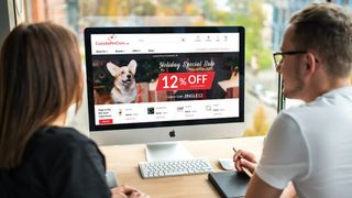 An image of two people browsing the CanadaPetCare website.