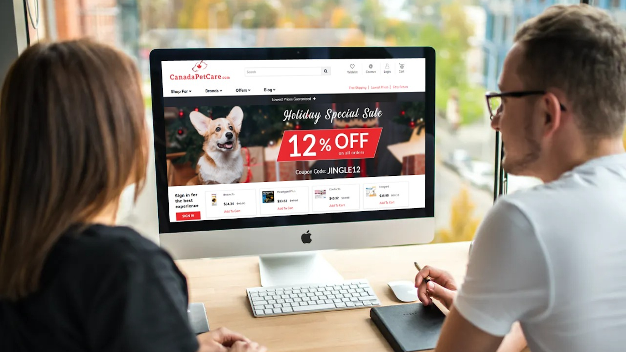 An image of two people browsing the CanadaPetCare website.