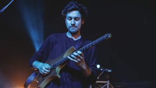 Australian guitarist Plini Roessler-Holgate performing live on stage during Download Festival at Donington Park on June 9, 2018. (Photo by )