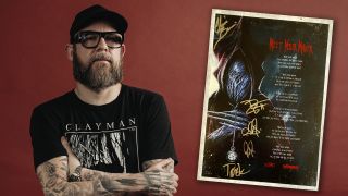 In Flames’ Anders Friden and a hand-signed lyyric sheet