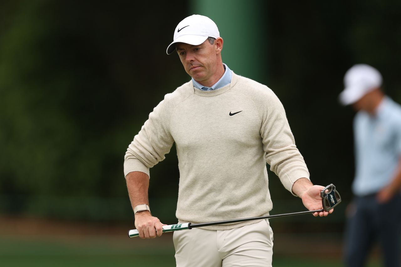 Rory McIlroy looks over an upcoming putt on the sixth hole green during a practice round prior to the 2026 Masters Tournament at Augusta National Golf Club