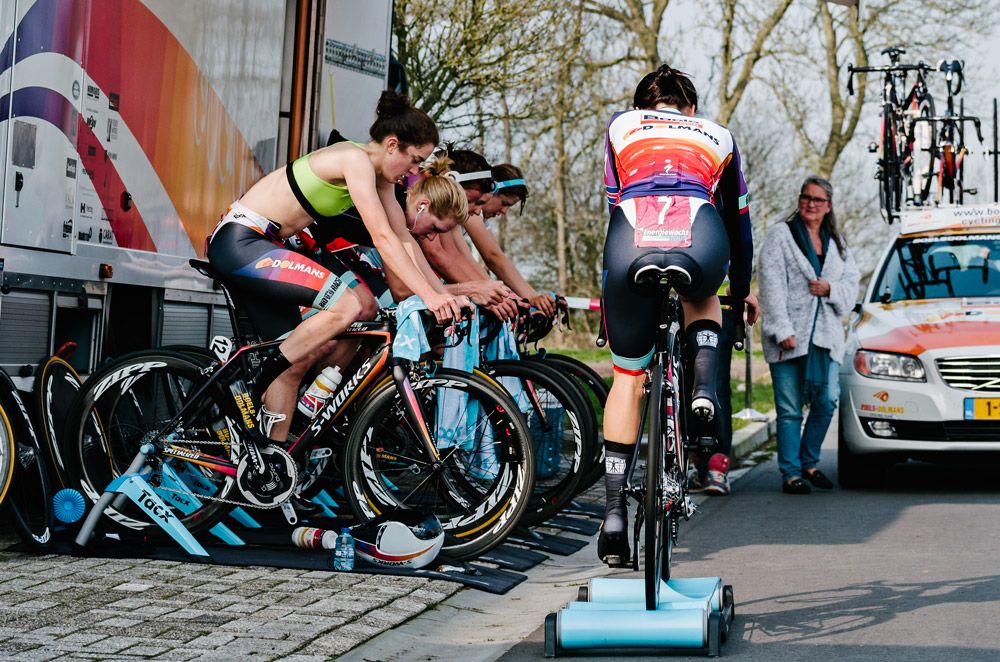 Riders warm up ahead of the team time trial