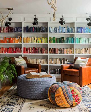 color coordinated books in white living room
