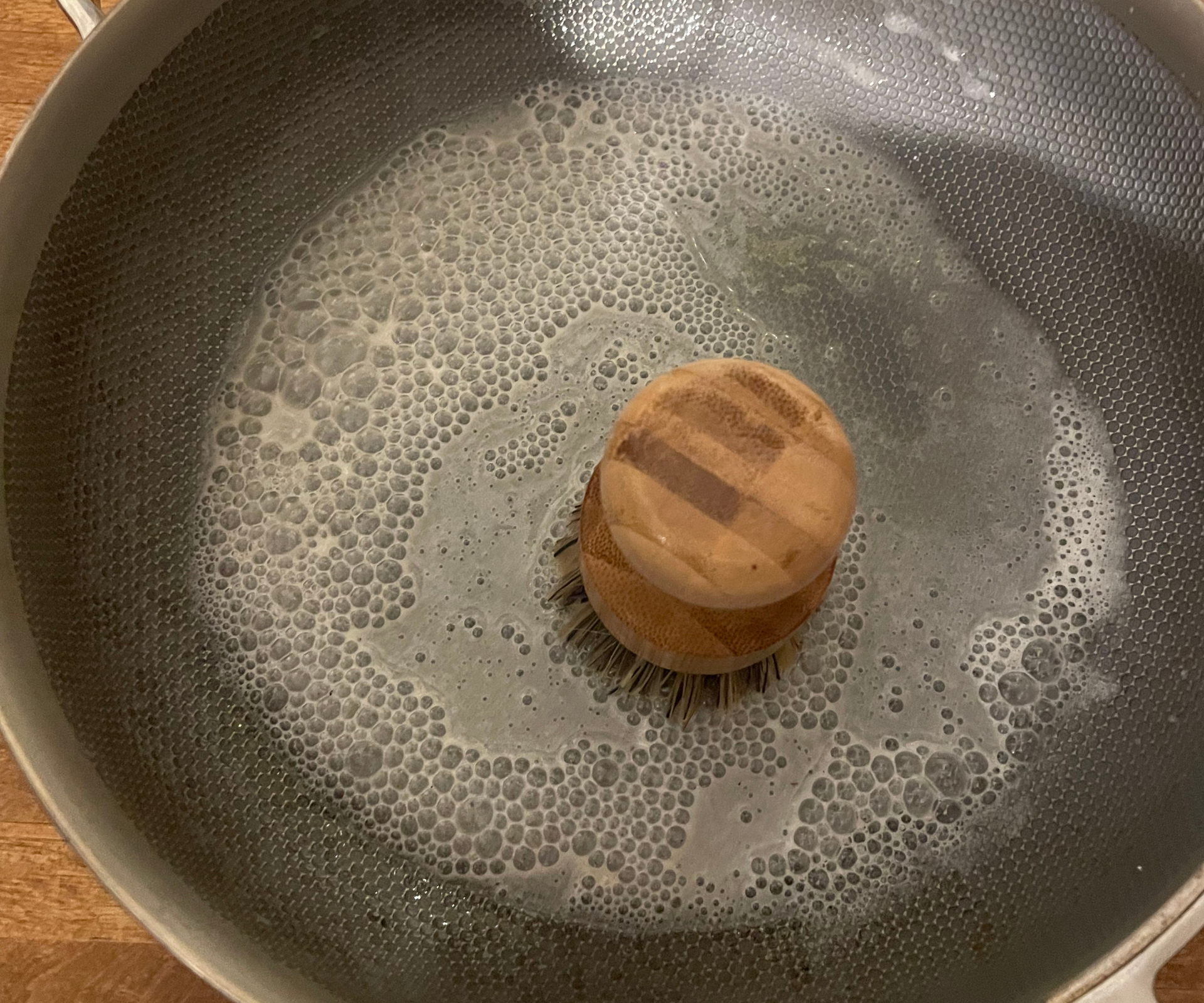 Our Place Titanium Always Pan Pro cleaning brush