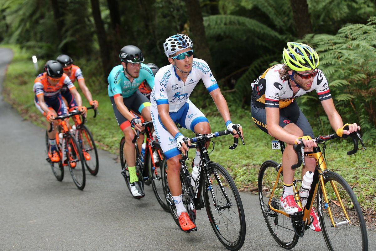 Tim Guy driving a group up the climb