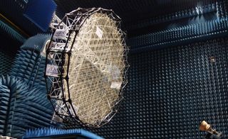 This metal-mesh antenna reflector was created as part of the European Space Agency's AMPER (Advanced techniques for mesh reflector with improved radiation pattern performance) project. Researchers are developing this mesh reflector technology to advance the performance and capabilities of large antennas.
