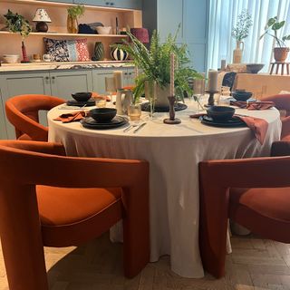 Marks & Spencer dining table and rust chairs