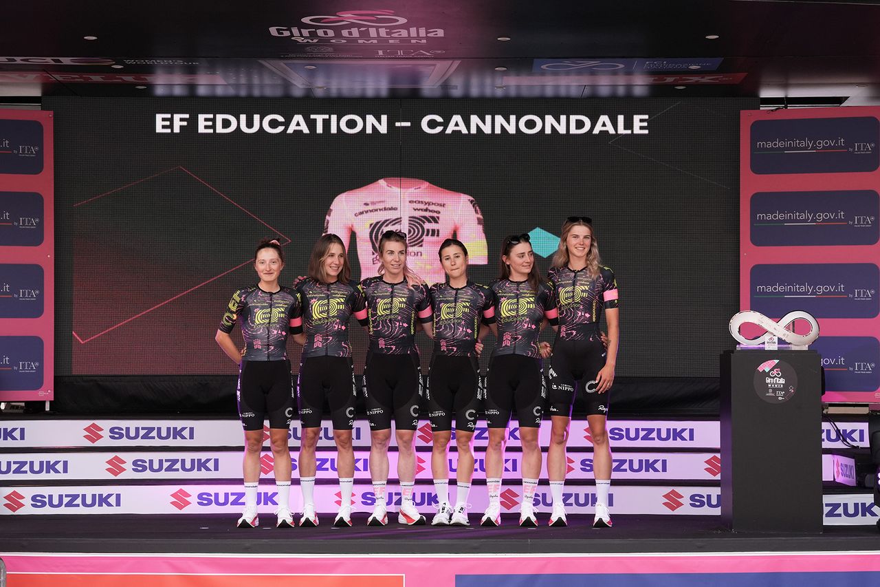 EF Education-Cannondale sport a new kit on stage at the 2024 Giro d'Italia Women at the teams presentation at the Piazza della Loggia in Brescia