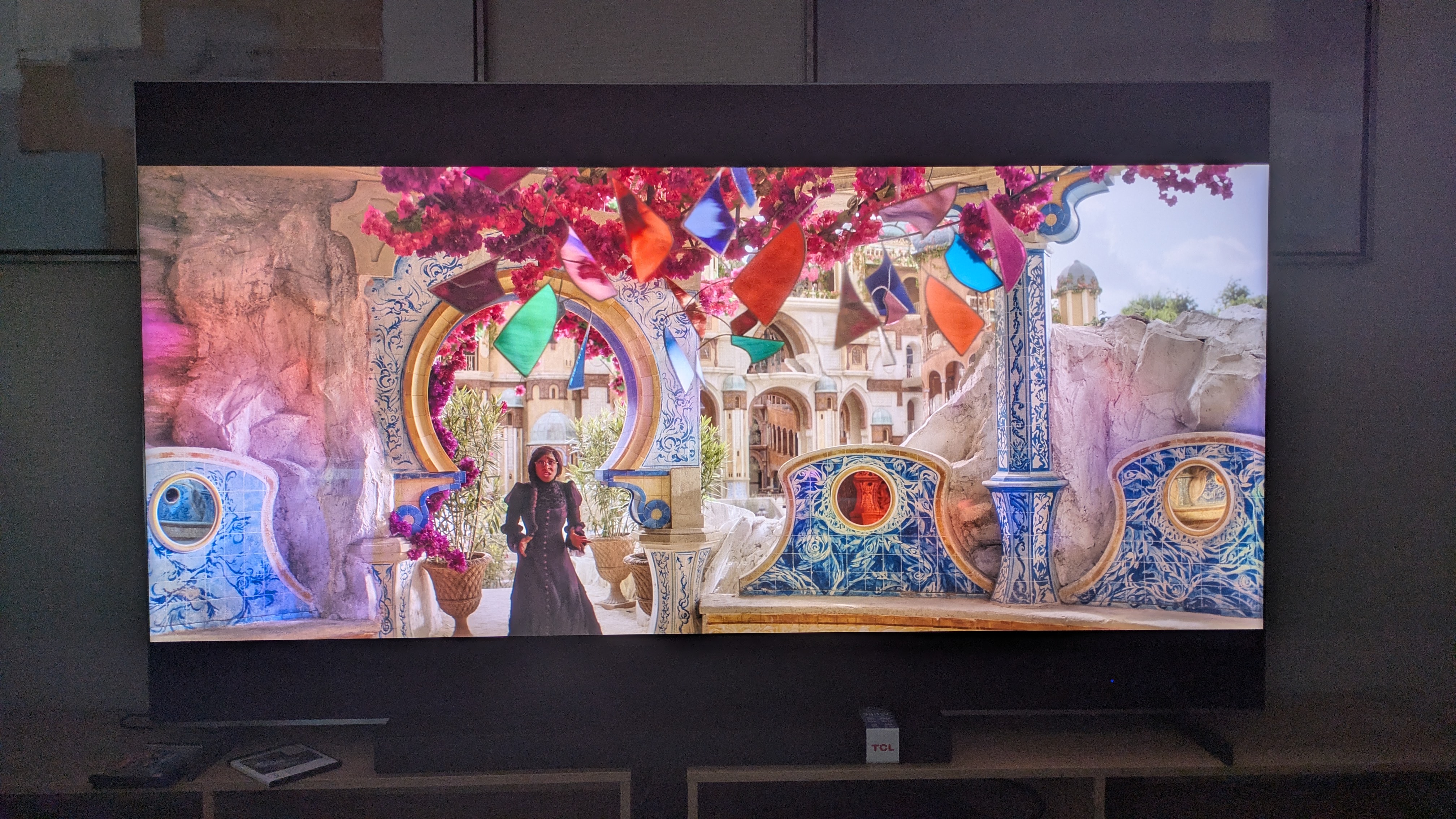 TCL 98-inch C8K with Elphaba from Wicked on screen