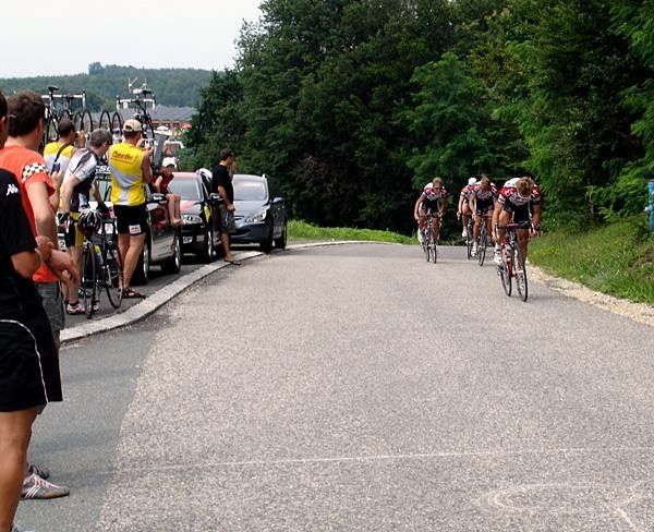 Fans watch the riders train as they sprint for prizes