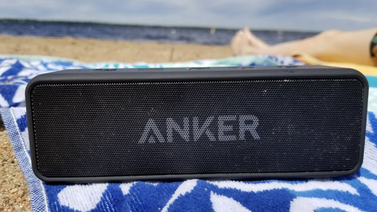 Anker Soundcore 2 on a beach towel kicking out killer tunes