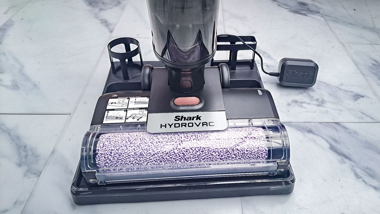 Shark HydroVac MessMaster cleaner on white floor tiles