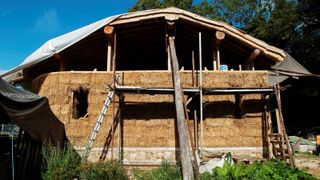 A home being built with straw bale insulation