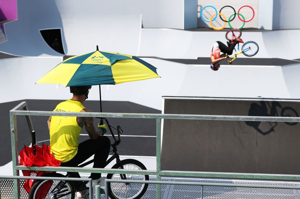 TOKYO JAPAN AUGUST 01 Logan Martin of Team Australia looks on from under a umbrella prior to the Mens Park Final of the BMX Freestyle on day nine of the Tokyo 2020 Olympic Games at Ariake Urban Sports Park on August 01 2021 in Tokyo Japan Photo by Ezra ShawGetty Images