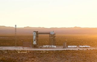 Blue Origin's New Shepard rocket and capsule stand atop the company's Launch Site One near Van Horn, Texas ahead of a planned launch of founder Jeff Bezos and three others on July 20, 2021.