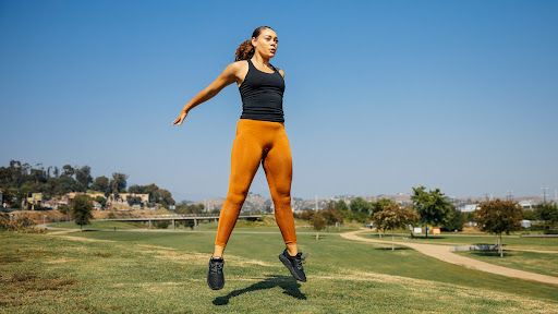 Woman jumping outside