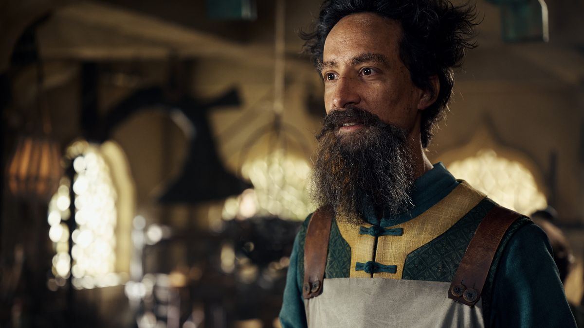 Danny Pudi in costume as The Mechanist from Netflix's Avatar: The Last Airbender
