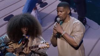 Jamie Foxx and his daughter, Anelise, performing on stage