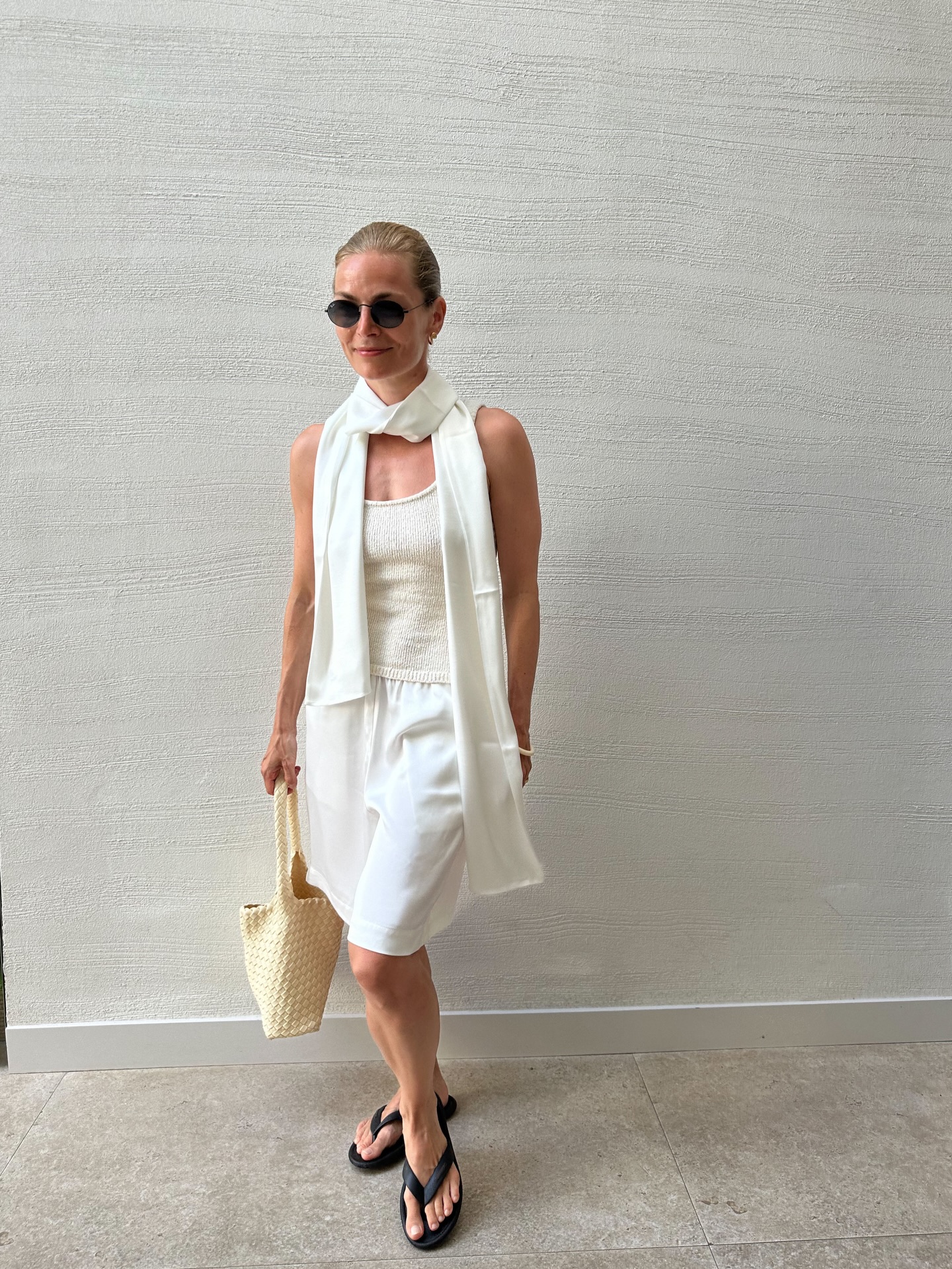 A woman wearing the thick-thong-sandal trend.