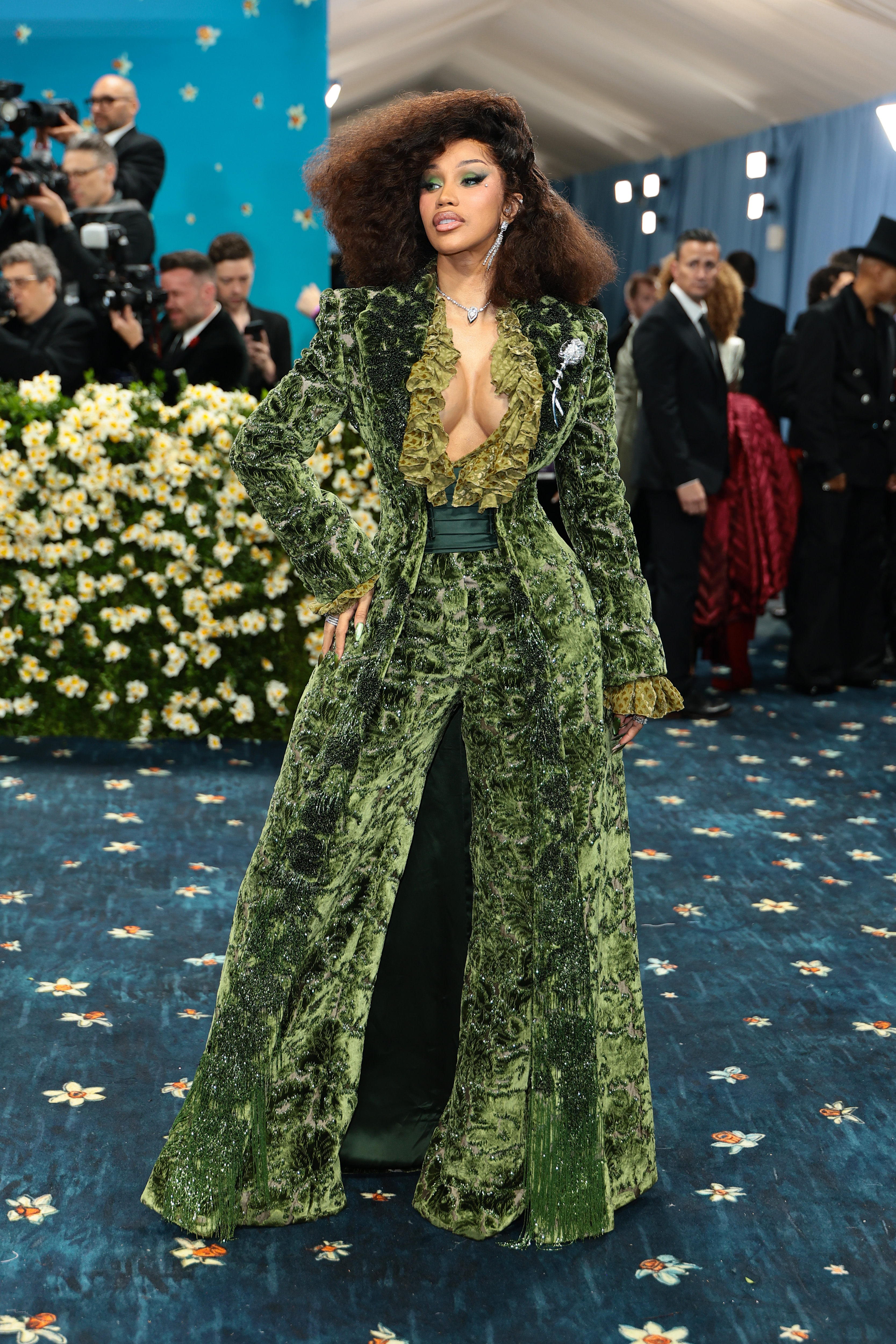 Cardi B at the 2025 Met Gala wearing a green dress