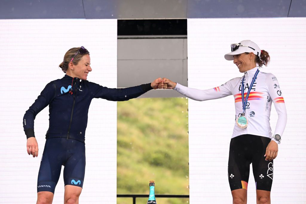 PASSO DEL MANIVA ITALY JULY 07 LR Annemiek Van Vleuten of Netherlands and Movistar Team on second place and Margarita Victoria Garcia Caellas of Spain and UAE Team Adq on third place congratulate each otheron the podium during the podium ceremony after the 33rd Giro dItalia Donne 2022 Stage 7 a 1129km stage from Prevalle to Passo del Maniva 1743m GiroDonne UCIWWT on July 07 2022 in Passo del Maniva Italy Photo by Dario BelingheriGetty Images