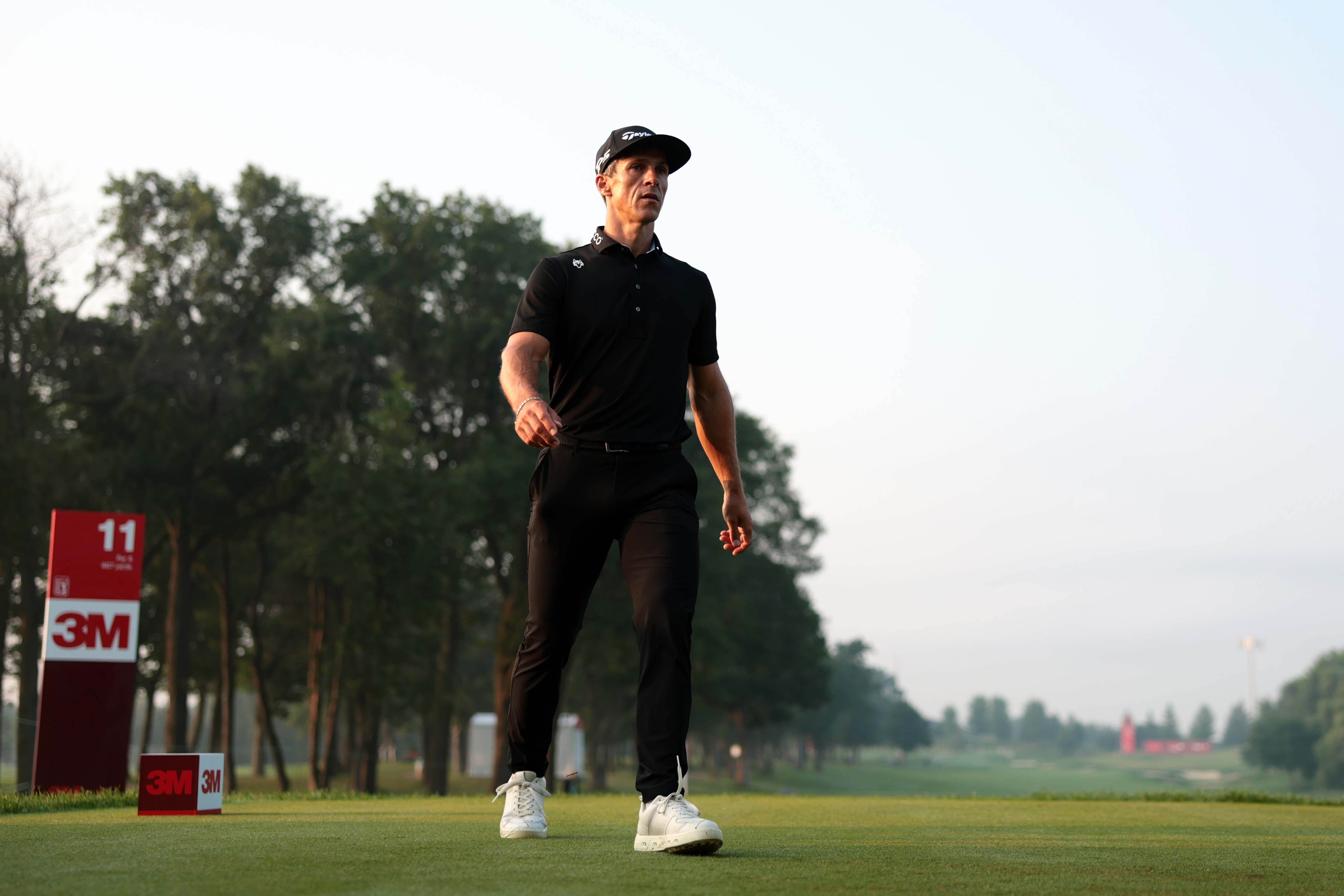 Thorbjorn Olesen walks on to the tee box