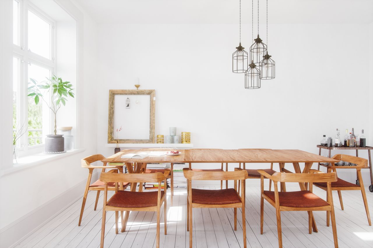 large wooden dining table in contemporary space