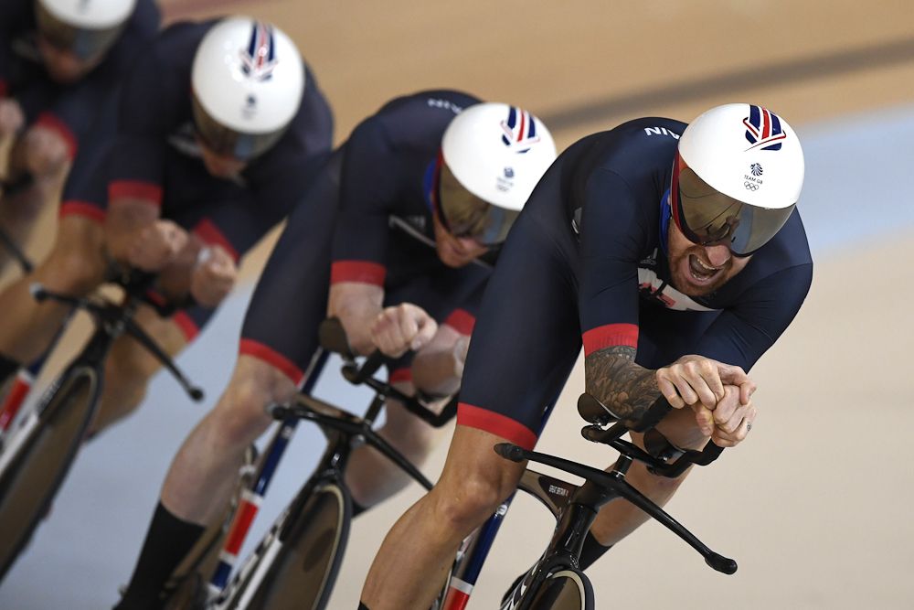 Britain's Edward Clancy, Steven Burke, Owain Doull and Bradley Wiggins compete in the men's Team Pursuit qualifying