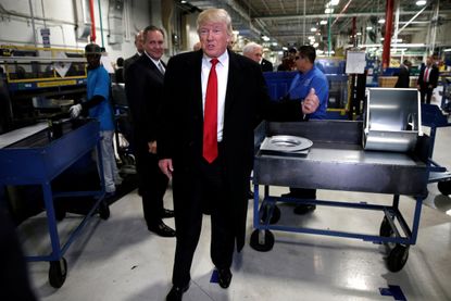 Trump visits the Carrier factory.