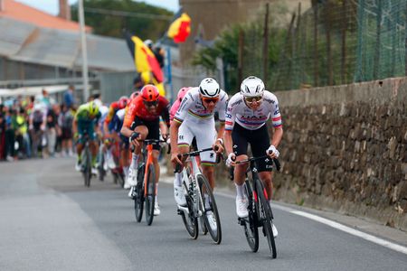 SANREMO ITALY MARCH 16 LR Mathieu van der Poel of The Netherlands and Team Alpecin Deceuninck and Tadej Pogacar of Slovenia and UAE Team Emirates attack in the breakaway during the 115th MilanoSanremo 2024 a 288km one day race from Pavia to Sanremo UCIWT on March 16 2024 in Sanremo Italy Photo by Luca Bettini PoolGetty Images