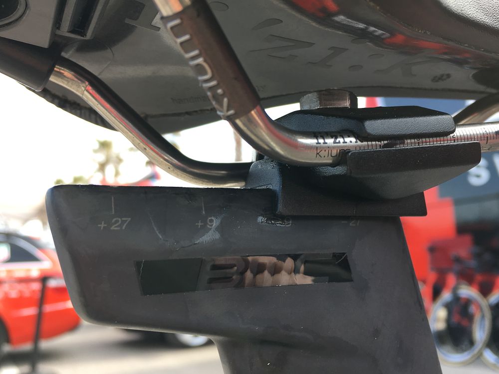 Dennis' saddle is set far forward