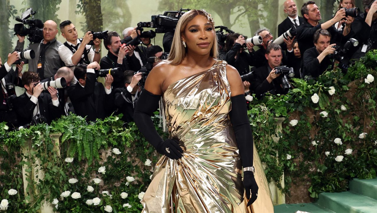 Serena Williams arrives on the Met Gala 2024 red carpet in a gold gown