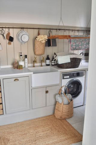 laundry room with hanging racks