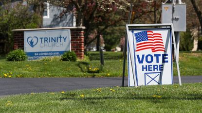 A 'vote here' sign outside of a church in Montour County, Pennsylvania.