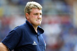 Steve Bruce looks on while managing Birmingham City, 2002