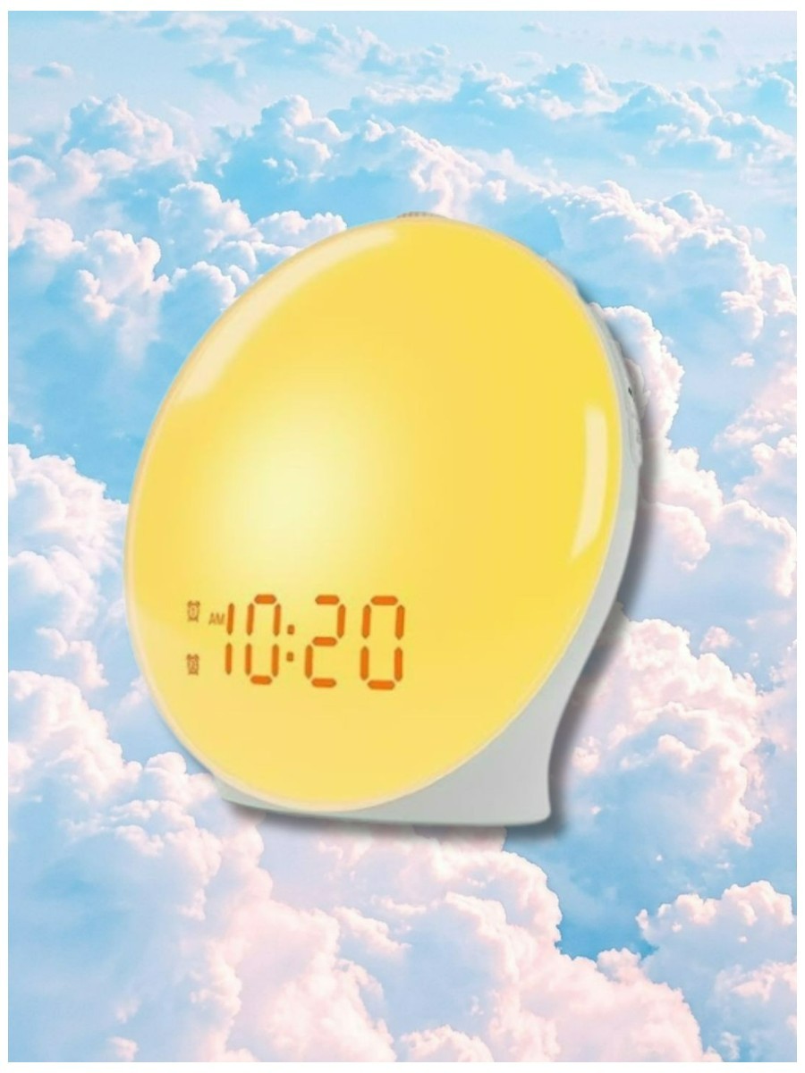 Te JALL wake-up light on a dreamy pastel cloud background.