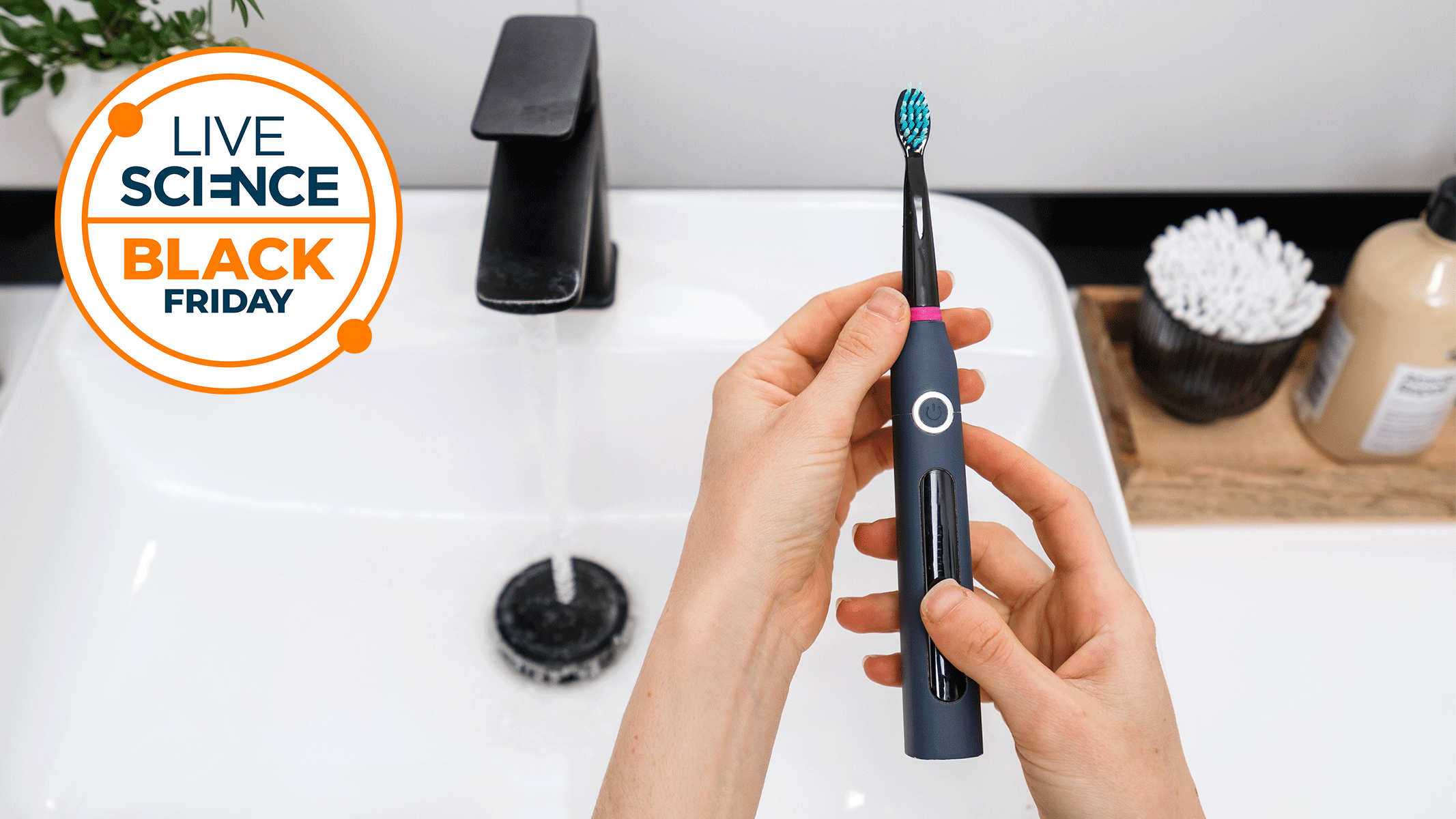 A Live Science Black Friday Deals logo and a close-up picture of a woman holding an electric toothbrush in a bathroom