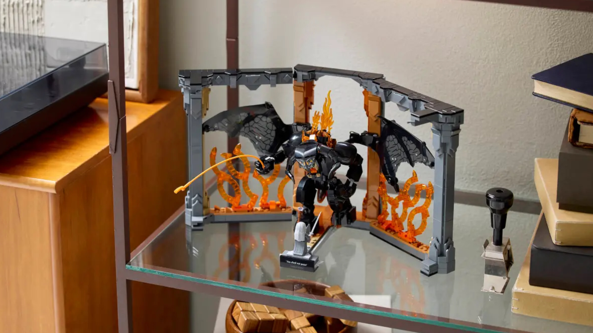 Lego Balrog Book Nook lies open on a glass shelf