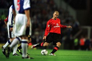 David Beckham scores a free-kick for Manchester United against Blackburn in August 2001.