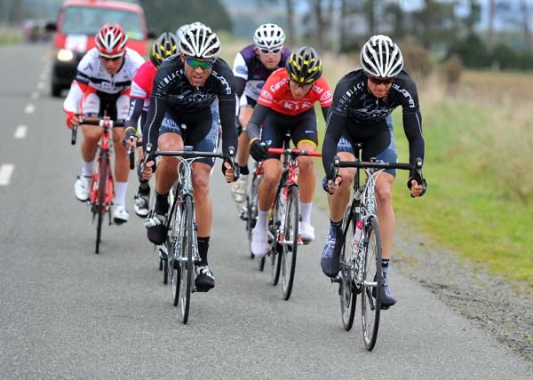 Pure Black Racing riders head the break.
