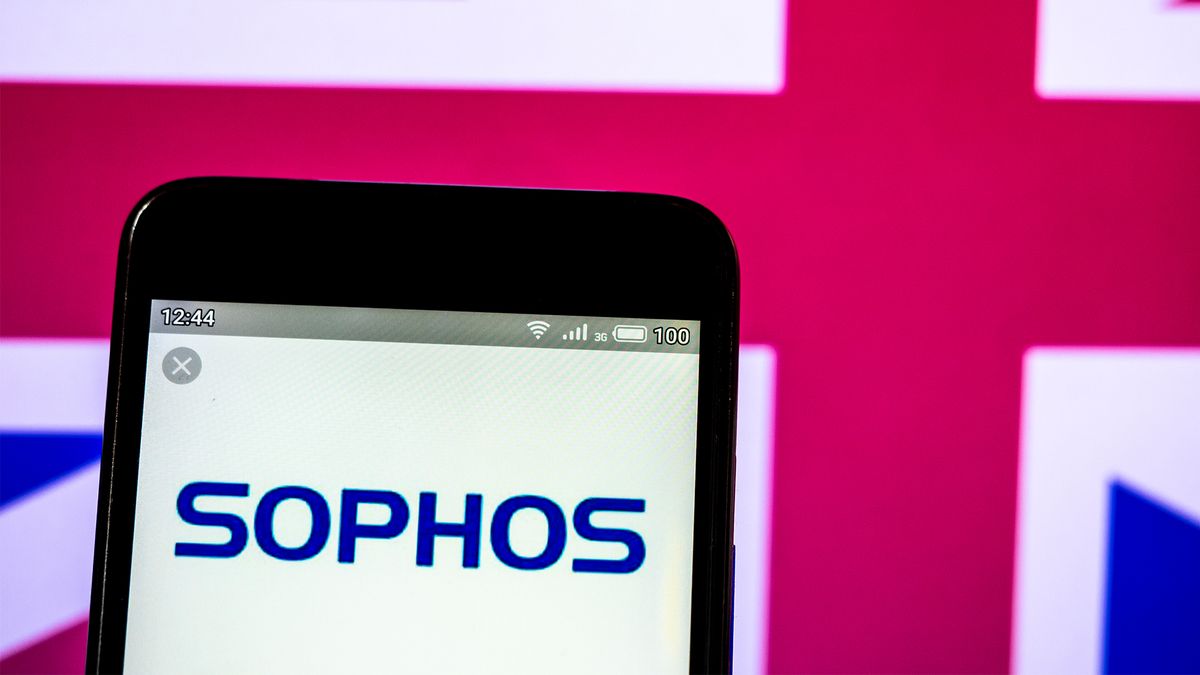 Sophos logo pictured on a smartphone screen with UK flag in background.