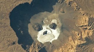 A skull shaped feature on the floor of a caldera