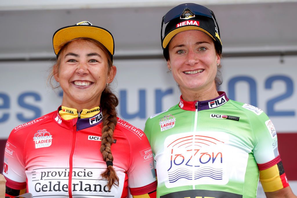 SWEIKHUIZEN NETHERLANDS AUGUST 28 LR Anouska Helena Koster of Netherlands and Marianne Vos of Netherlands and Team Jumbo Visma celebrate winning the most combative rider jersey and green points jersey on the podium ceremony after the 23rd Simac Ladies Tour 2021 Stage 4 a 1489km stage from Geleen to Sweikhuizen SLT2021 UCIWWT on August 28 2021 in Sweikhuizen Netherlands Photo by Bas CzerwinskiGetty Images