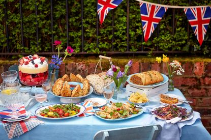 A selection of the best buffet food ideas displayed on a table decorated for a street party