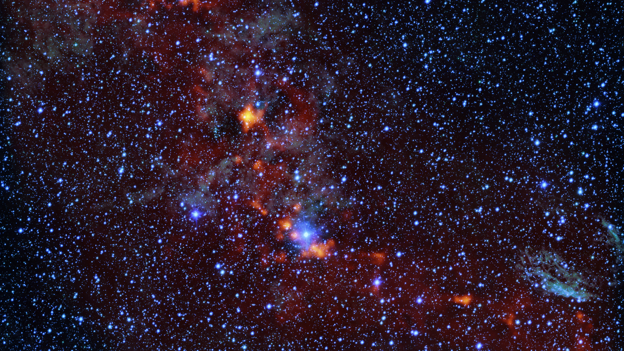 Glowing red clouds in deep space as seen by the Very Large Telescope Surevy Telescope and APEX.