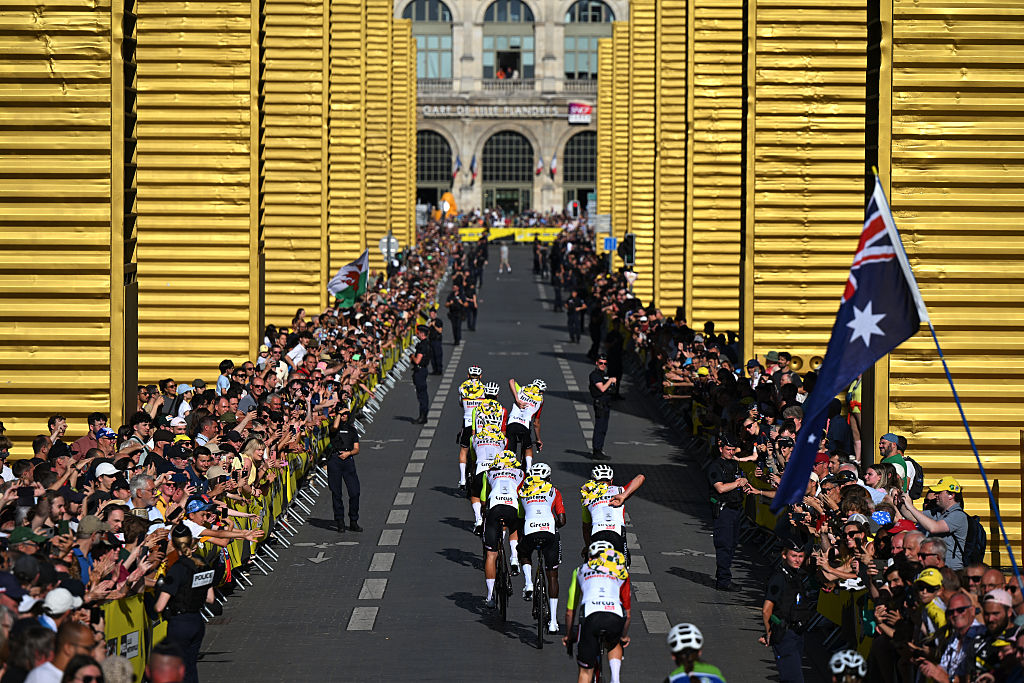 LILLE, FRANCE - JULY 03: A general view of Biniam Girmay of Eritrea, Louis Barre of France, Vito Braet of Belgium, Hugo Page of France, Laurenz Rex of Belgium, Jonas Rutsch of Germany, Roel Van Sintmaartensdijk of Netherlands, Georg Zimmermann of Germany and Team Intermarche - Wanty during the team presentation prior to the 112th Tour de France 2025 / #UCIWT / on July 03, 2025 in Lille, France. (Photo by Dario Belingheri/Getty Images)