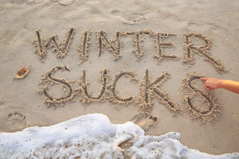 Spelling Words On Sand To Express I Hate Winter, Seasonal Affective Disorder