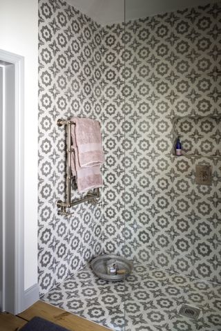 shower with patterned tiles